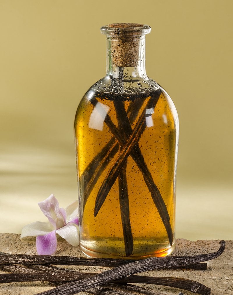 vanilla beans in a glass bottle to make vanilla extract