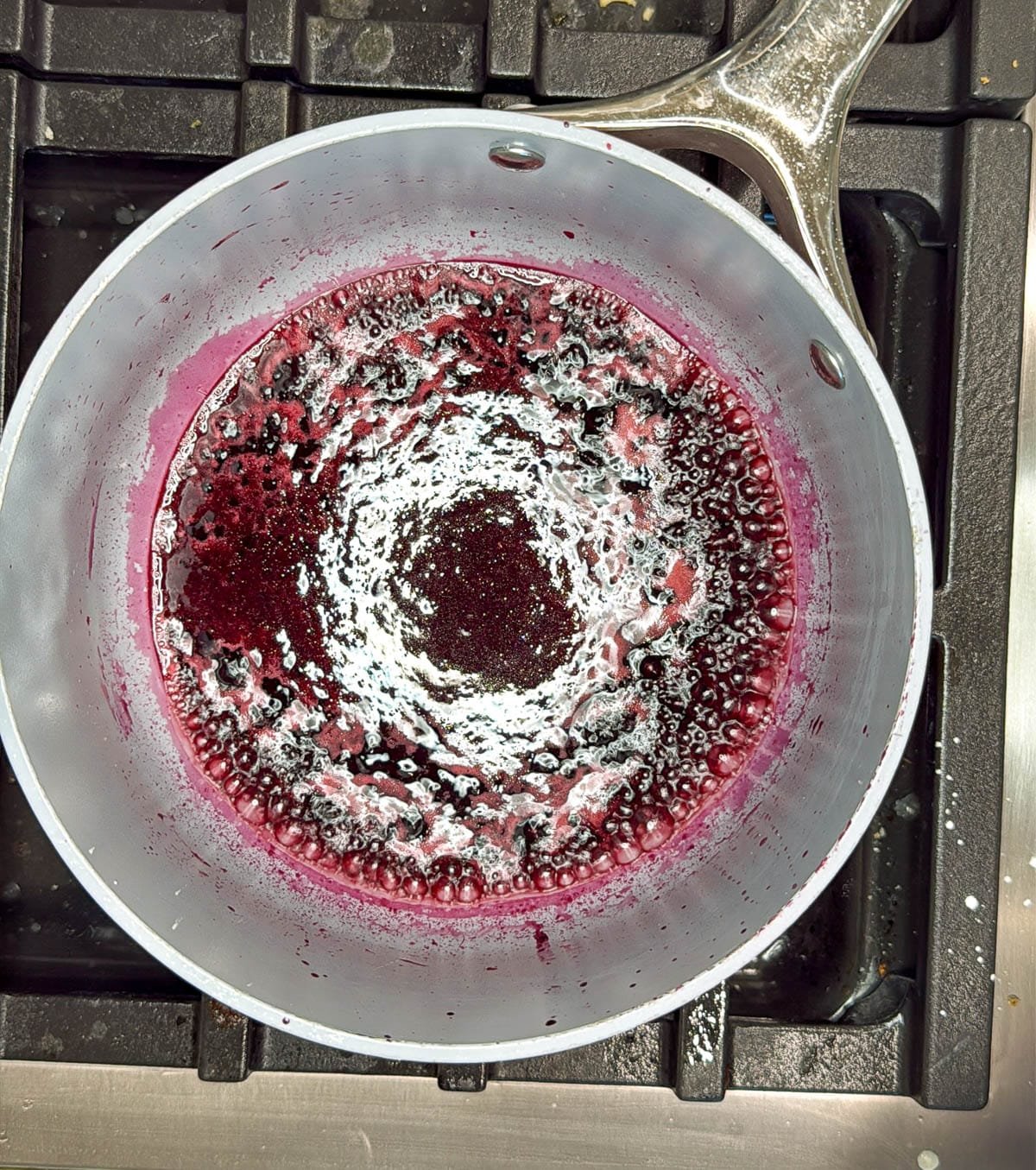 blackberry juice in a saucepan