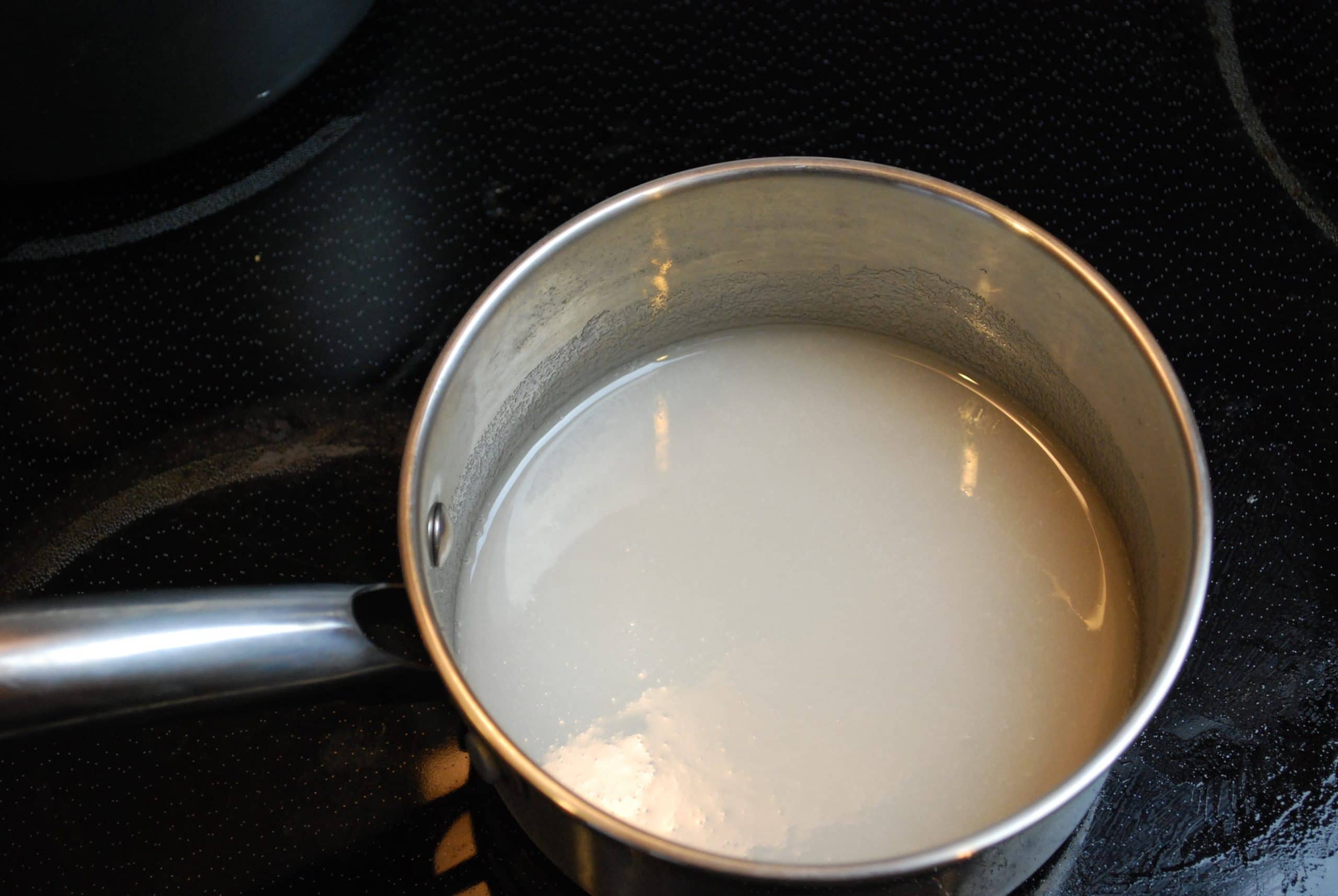heat heavy cream in a sauce pan until it starts to steam