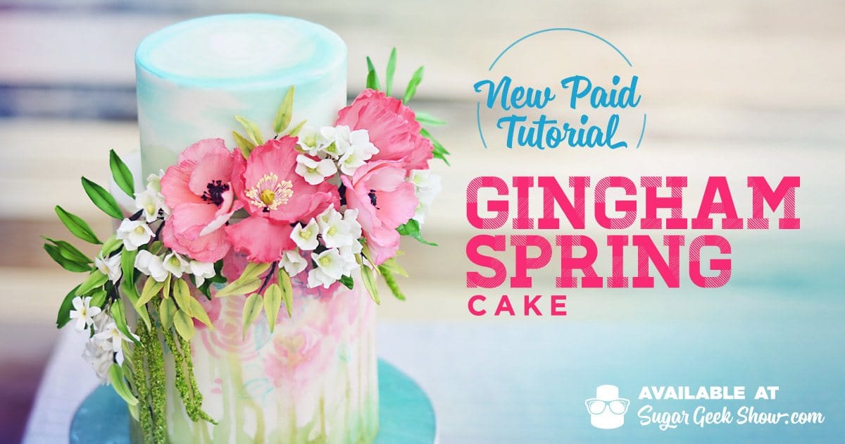 Gingham Spring Cake Paid Tutorial from Sugar Geek Show featuring watercolors, floral spray, and surprise cake pattern inside