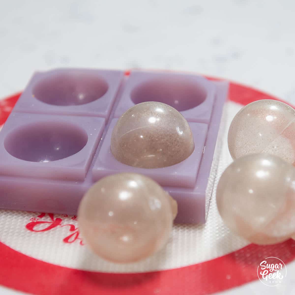 close up of sugar sphere in mold