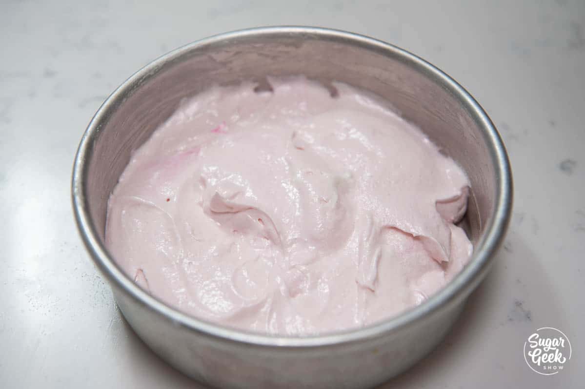 pink champagne cake batter in a cake pan
