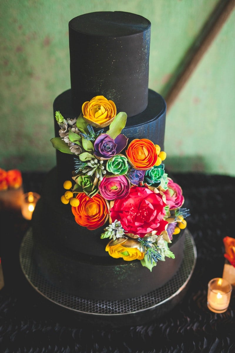 Black Cake with Colorful Flowers