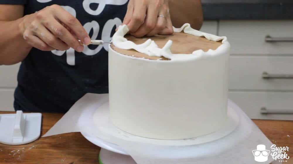 How to achieve sharp edges on cake with butter ganache