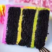 close up of a slice of black velvet cake