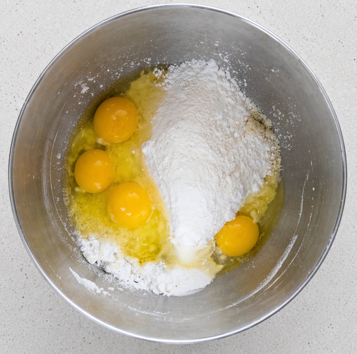 Joconde ingredients in the bowl of a stand mixer.