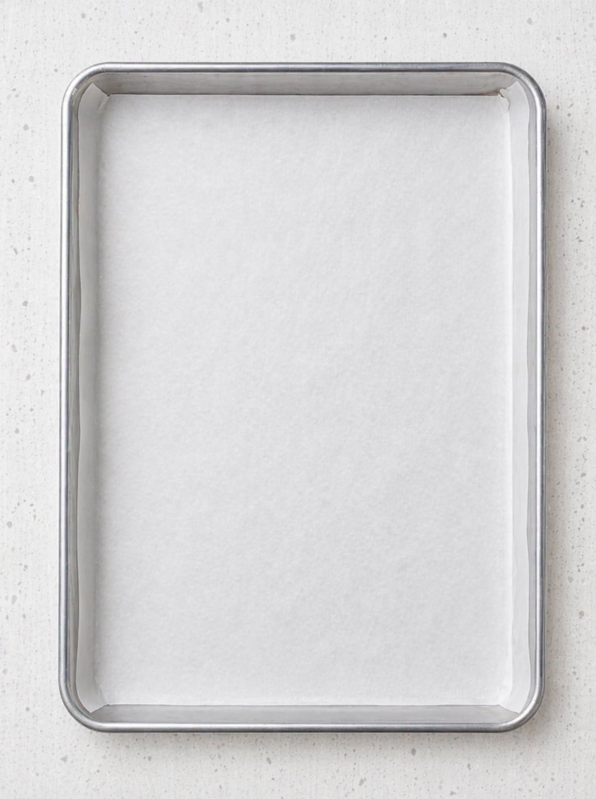 Sheet pan covered in parchment paper