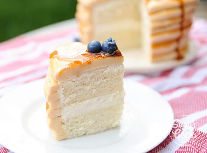 slice of cake covered in fondant decorated to look like a stack of pancakes