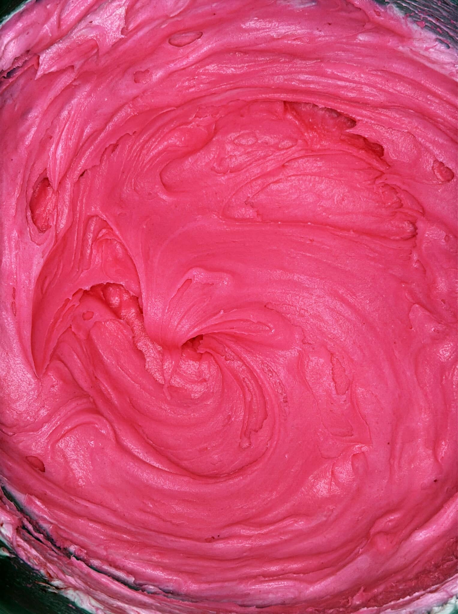 close up of bright pink buttercream

