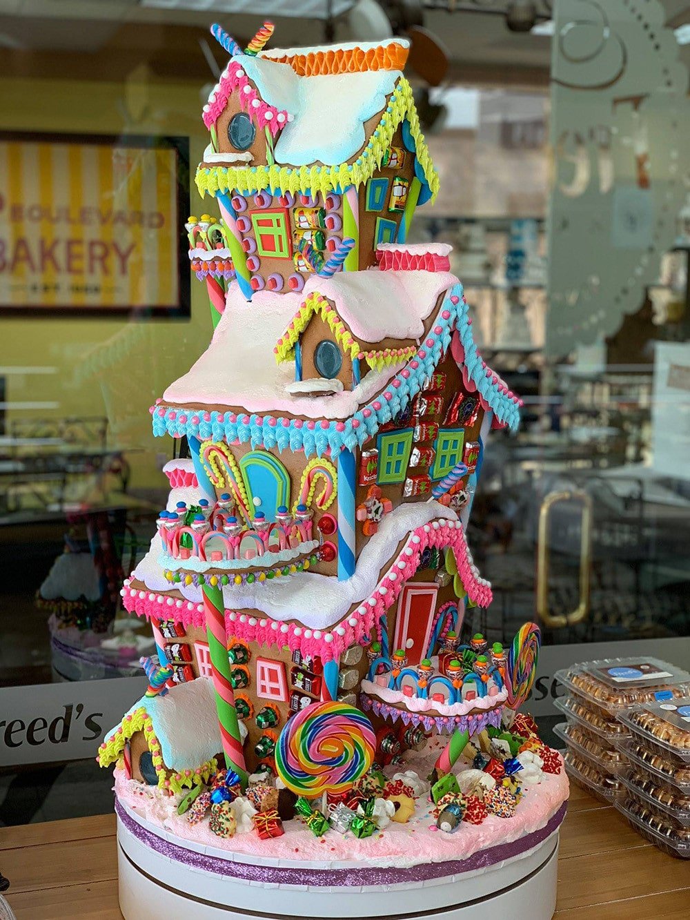 Amazing gingerbread house display made by Sonny Robertson of Freed's bakery in Las Vegas. I love the colors so much!