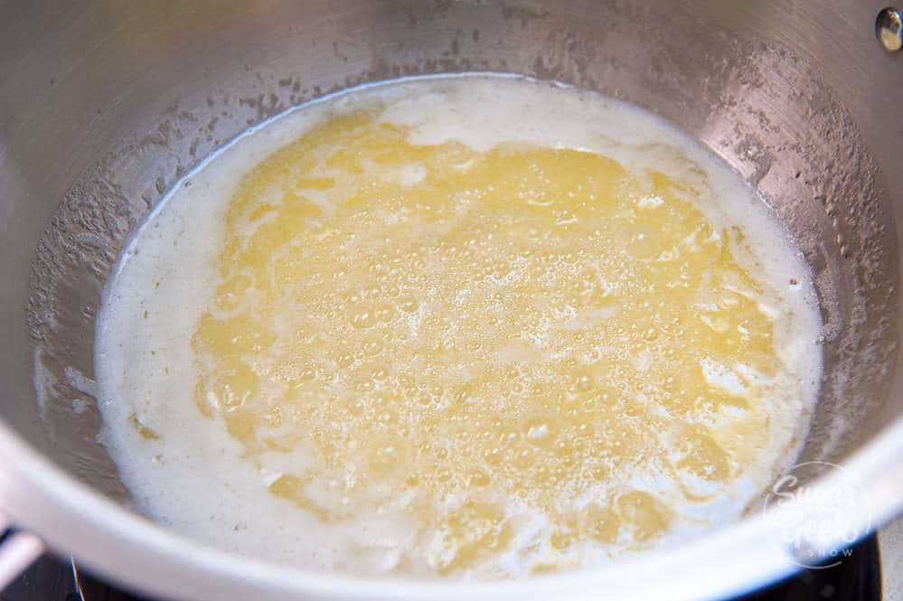 close up of melted butter in a saucepan