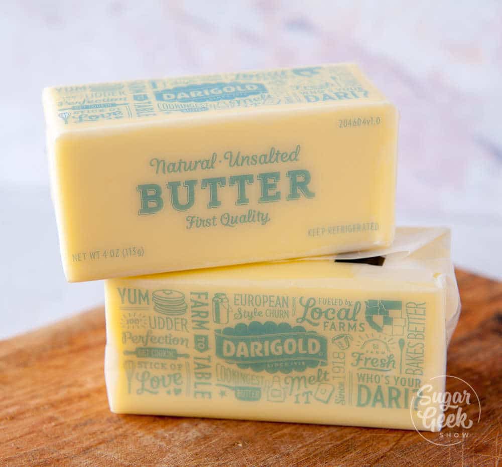 close up of two butter sticks stacked on top of each other