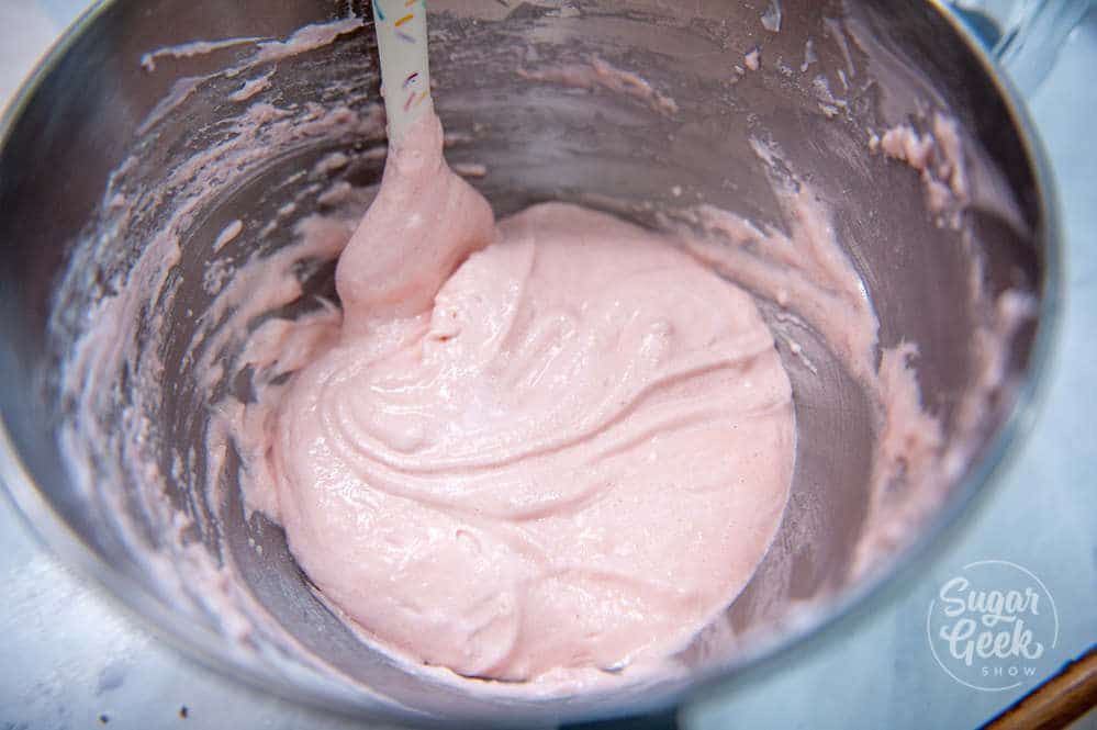 strawberry macaron batter in a bowl