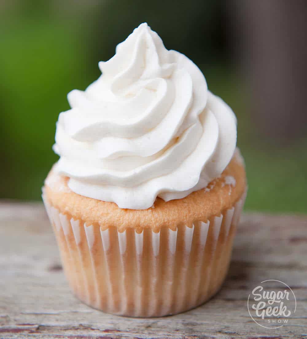 ermine frosting piped on a while velvet cupcake