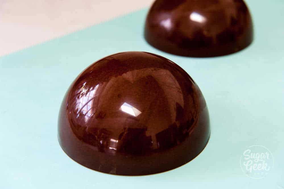 https://sugargeekshow.com/wp-content/uploads/2019/06/chocolate_caramel_candy.jpg