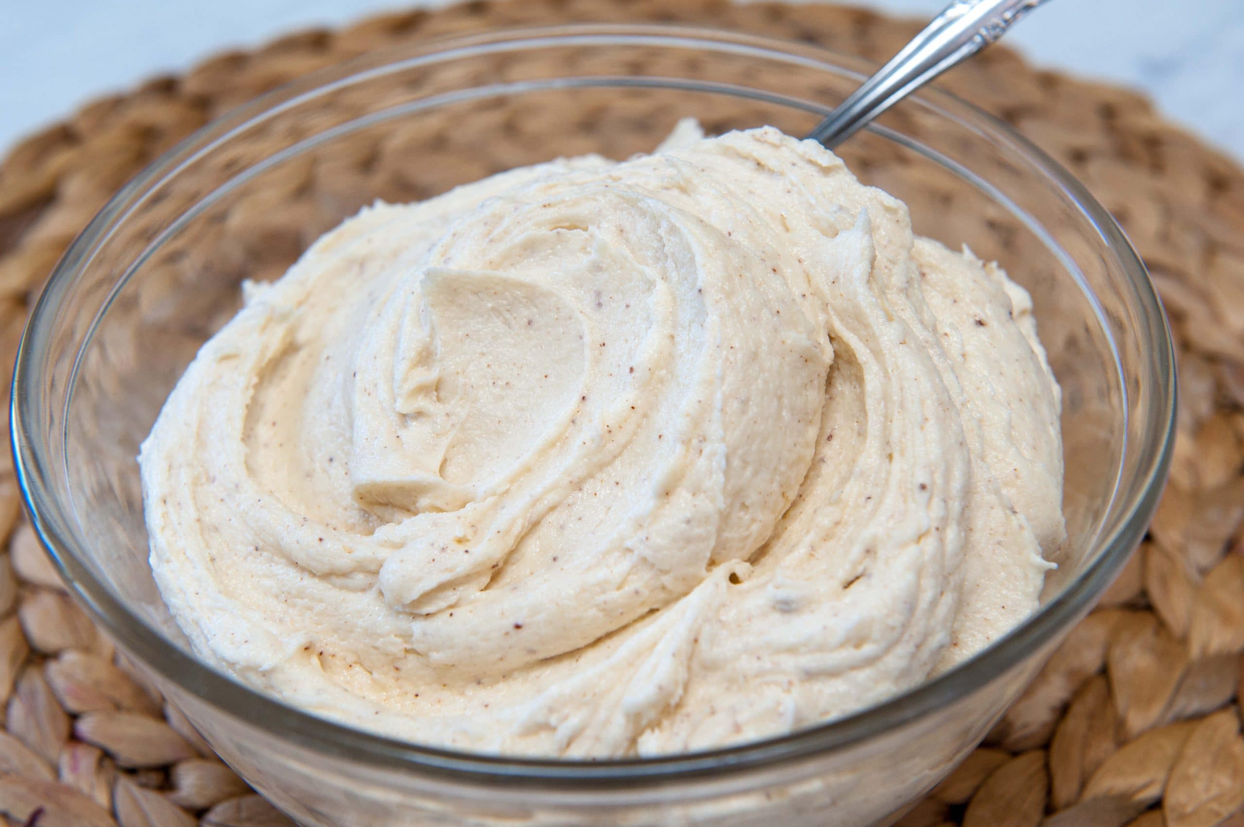brown butter frosting in a clear bowl