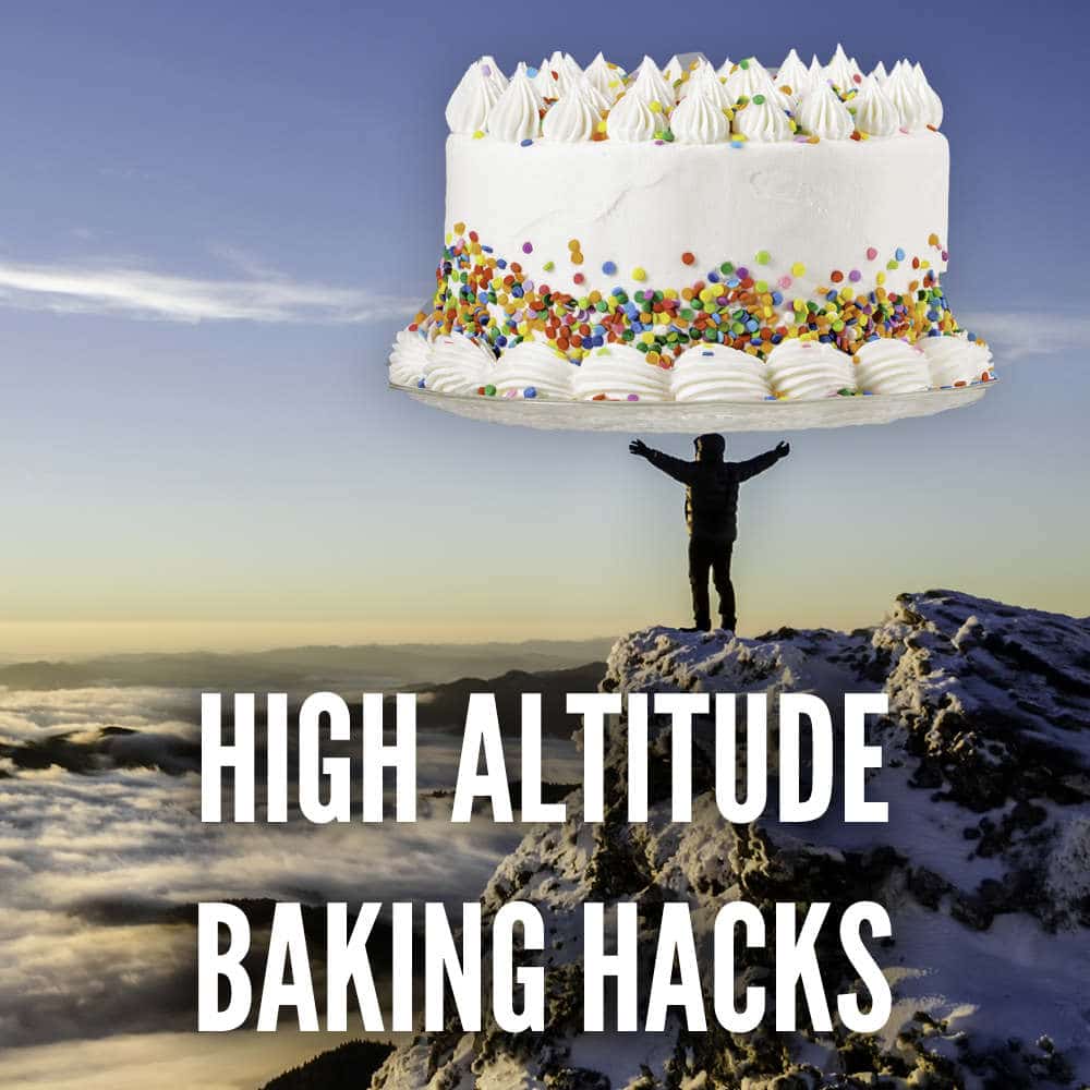 high altitude baking hacks. Baker stands at the top of a mountain holding a giant frosted cake with sprinkles