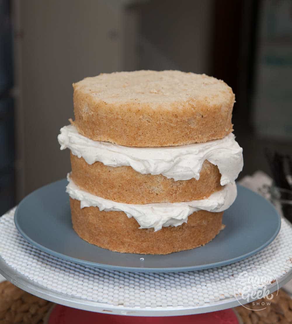 brown butter cake layers with frosting in between