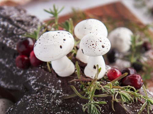 User in r/baking made a Bûche de Noël, with Meringue Mushrooms and