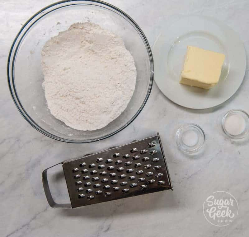 ingredients of flour, butter and a cheese grater
