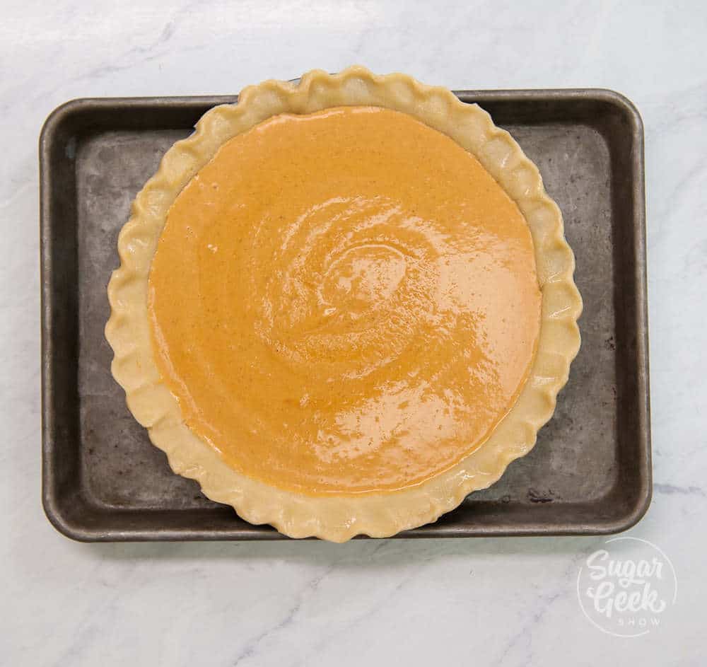 pumpkin pie on sheet pan to prevent spilling
