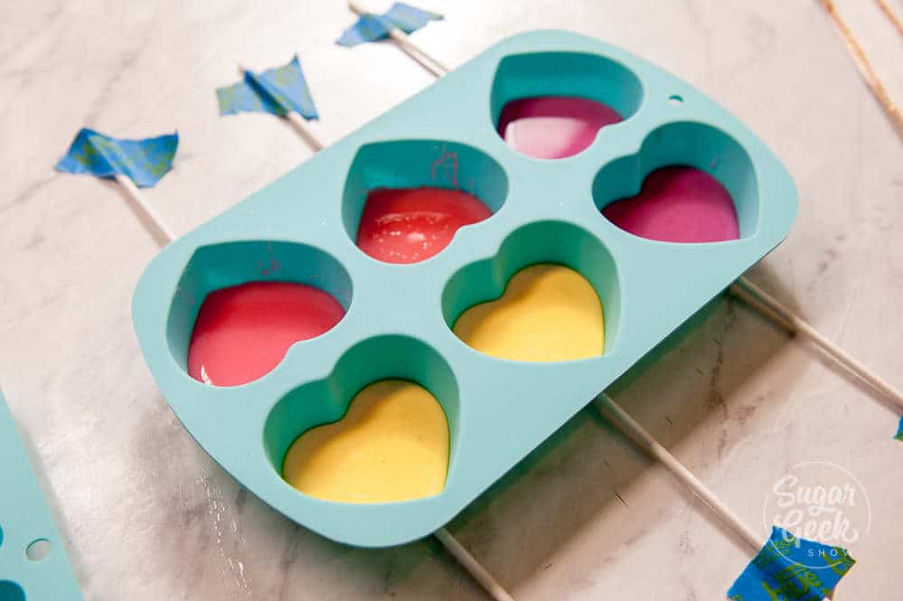 lollipop mold filled with homemade lollipop candy