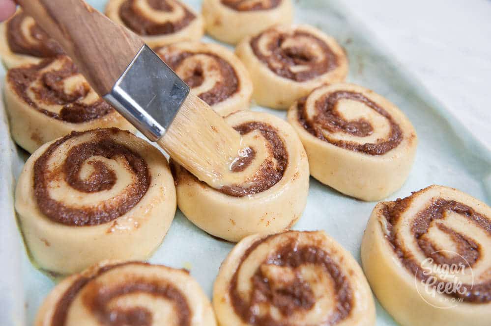 brush the proofed cinnamon rolls with egg wash