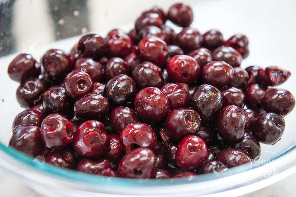 pitted cherries in a bowl