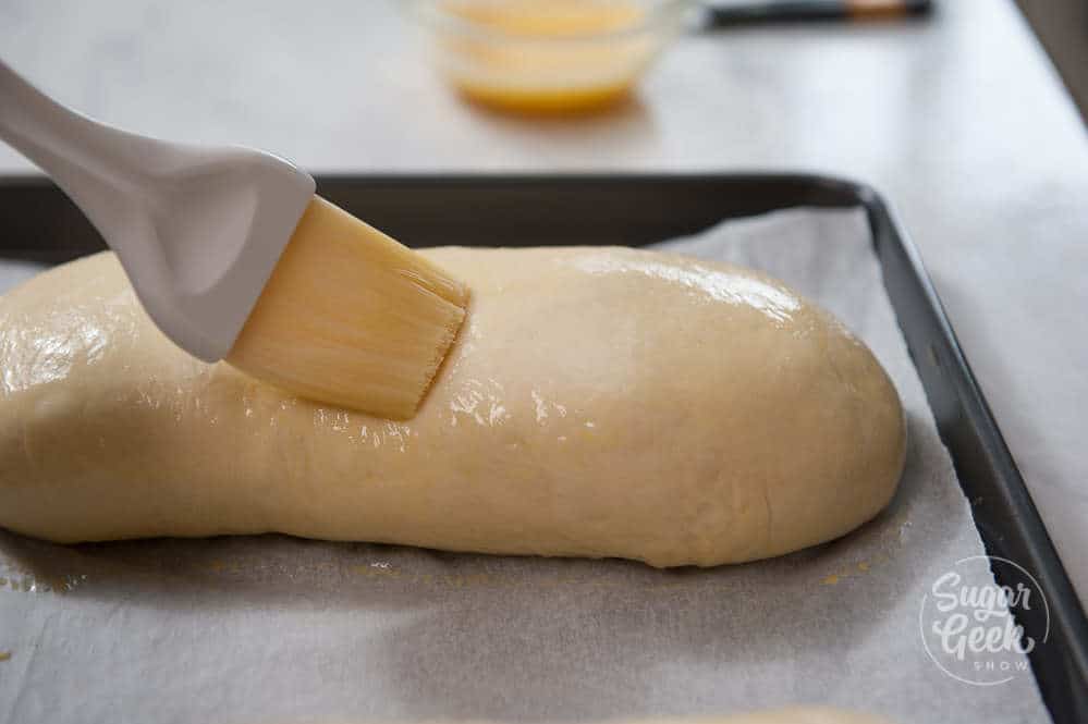 Brush the loaf with egg wash