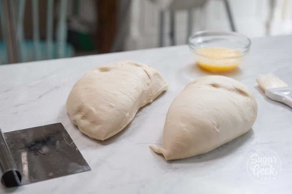 shaping the dough into two loaves