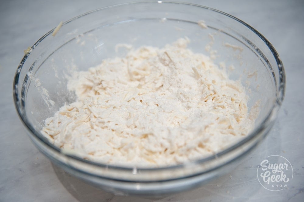 butter and flour mixture for strawberry shortcake in clear blowl