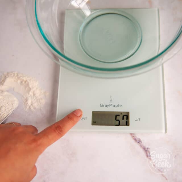 digital kitchen scale with clear bowl on top