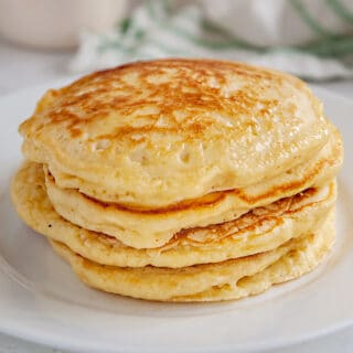 sourdough pancakes on a white plate