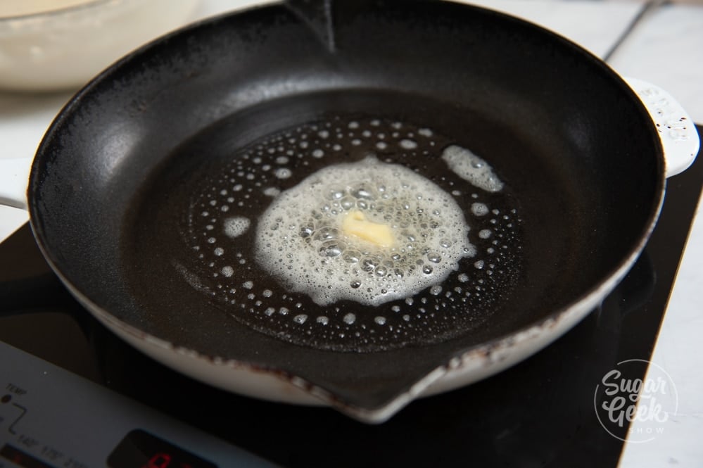 melted butter in a hot cast iron skillet