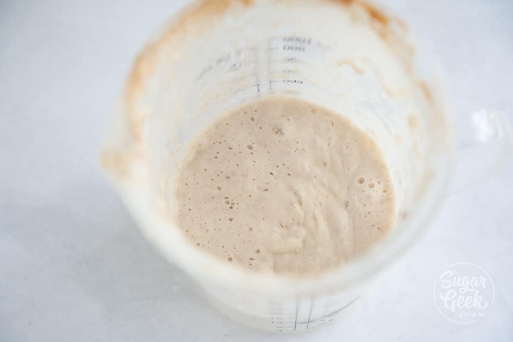 sourdough starter in clear container shot from above