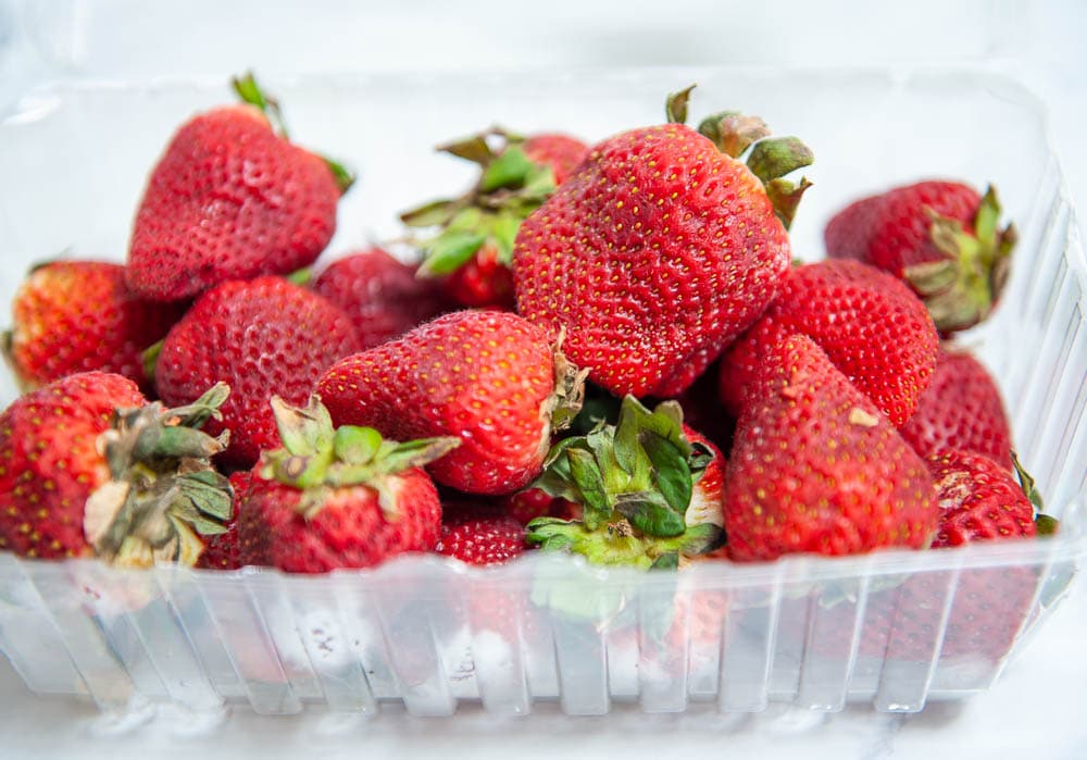 strawberries in plastic container