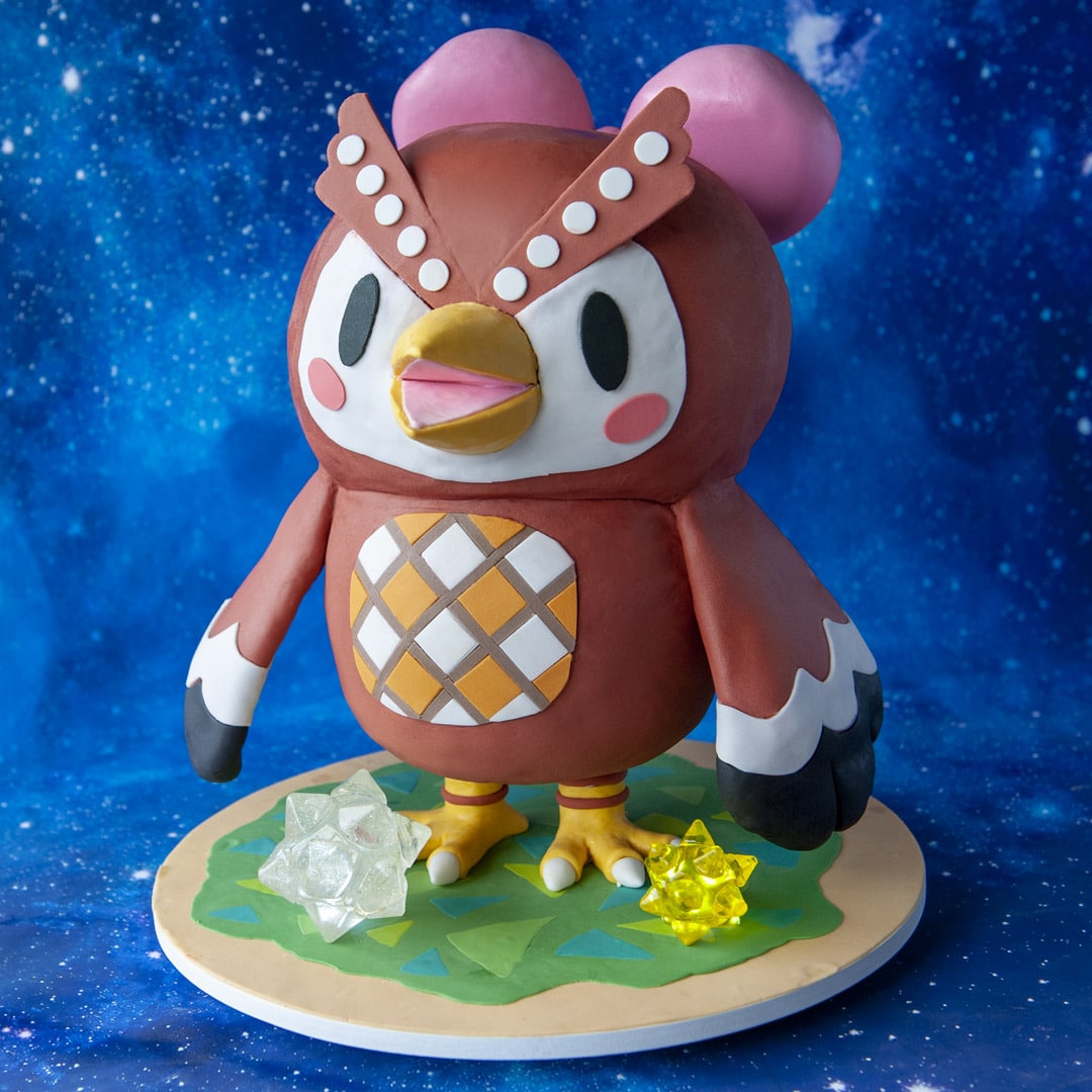 Animal Crossing Celeste Cake with green grass cake board and isomalt star fragments