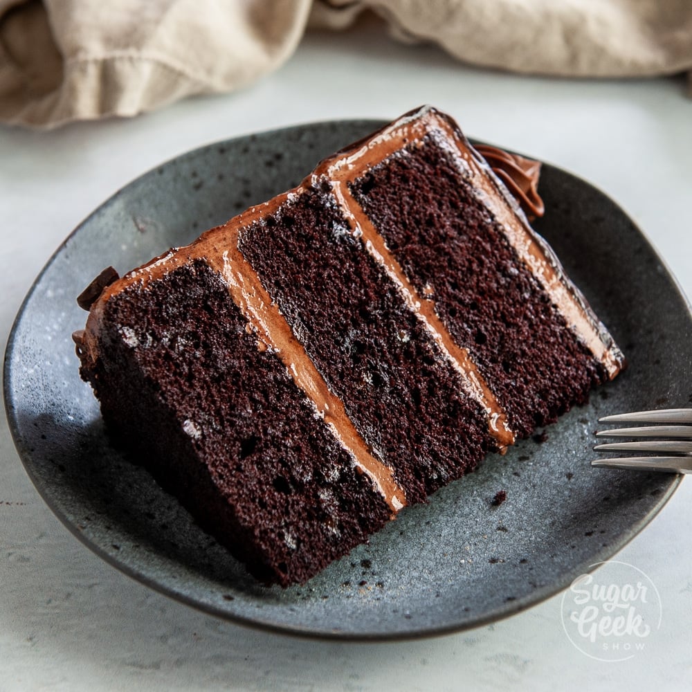 slice of chocolate cake on a grey plate