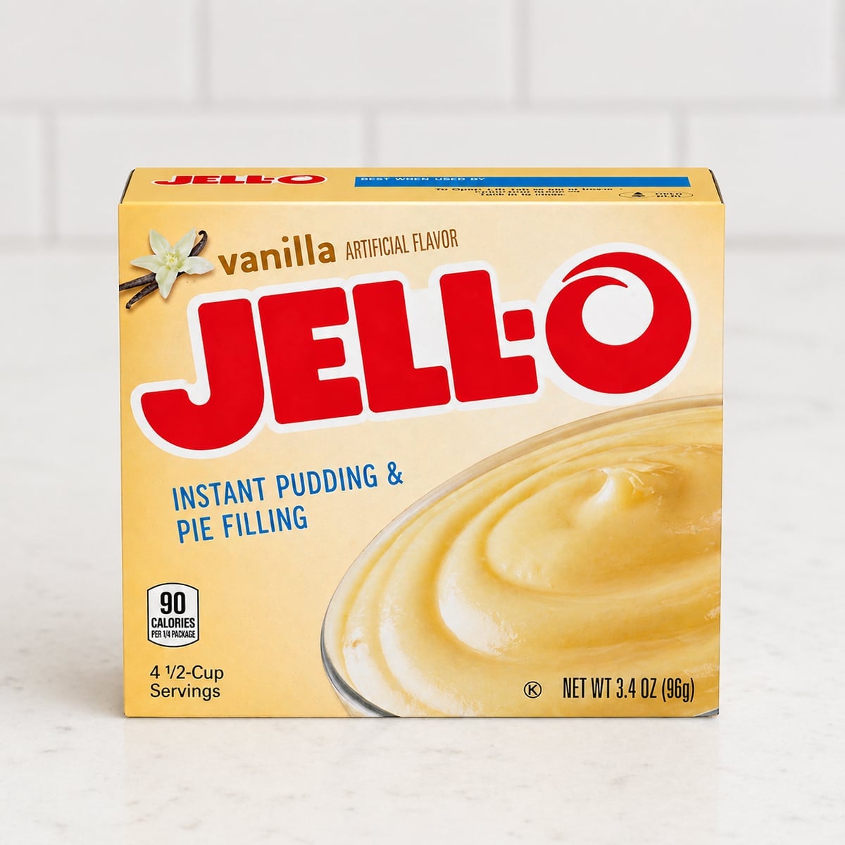 Box of jello pudding mix on a white countertop.