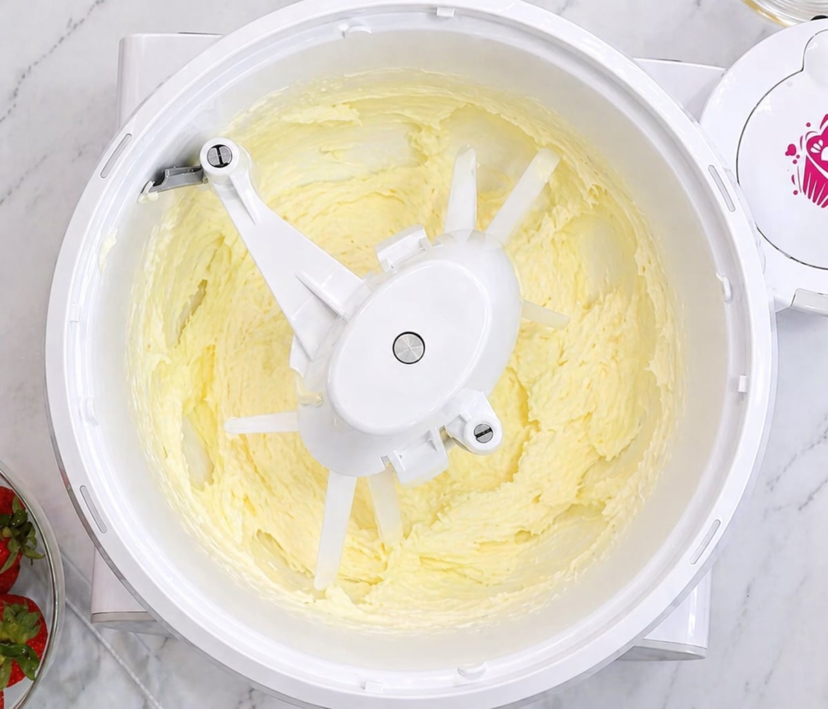 Creamed butter in the bowl of a mixer.