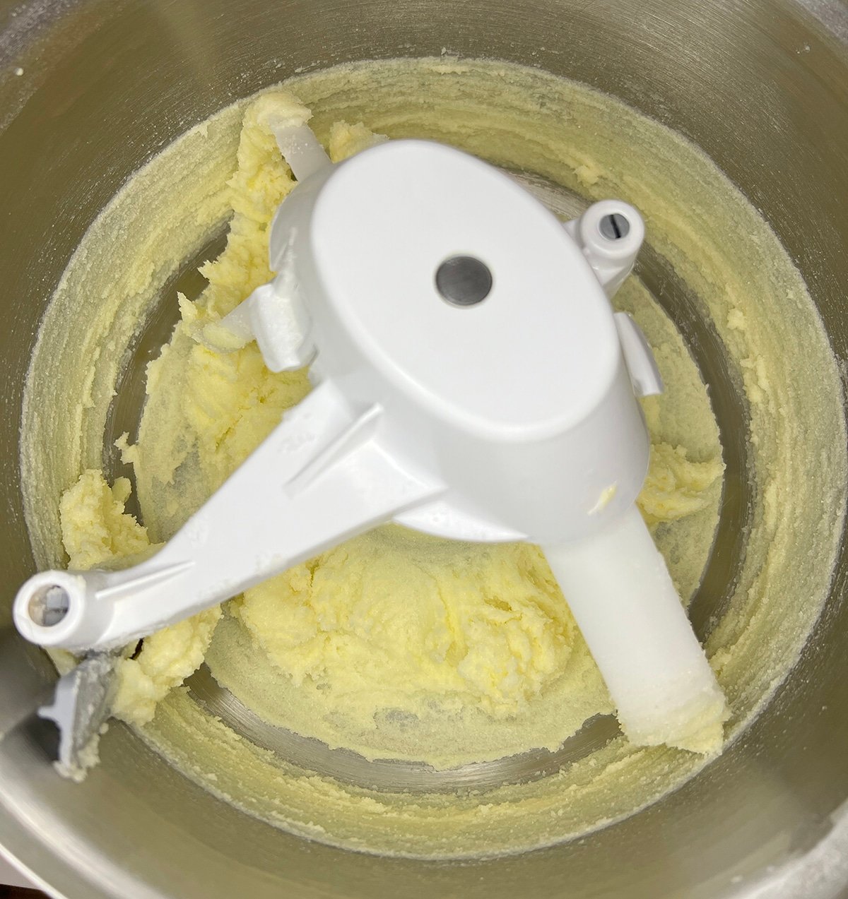 close up of creamed butter in a stand mixer