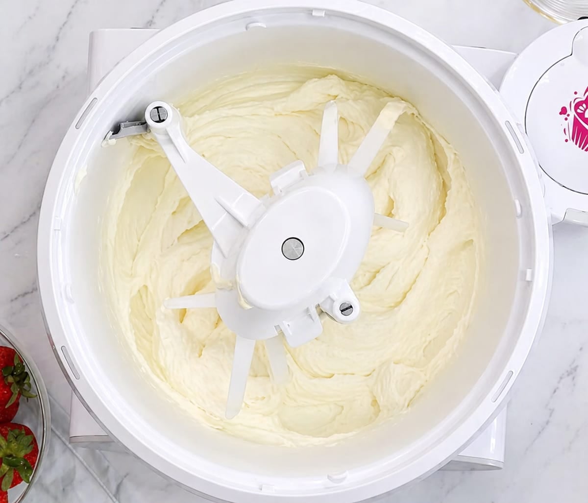 Creamed butter and sugar in the bowl of a mixer.