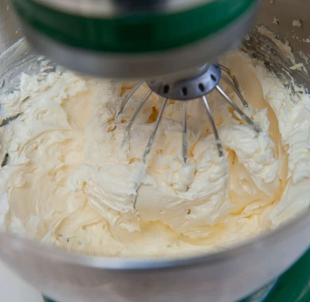easy buttercream frosting in a metal mixing bowl