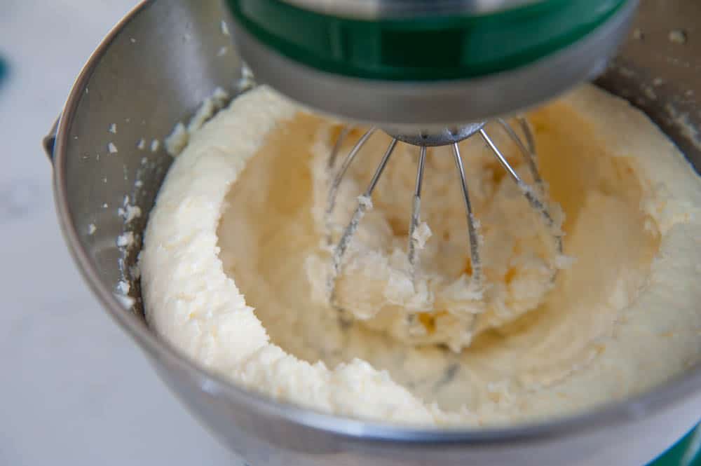 cold buttercream forming a ridge in the mixing bowl