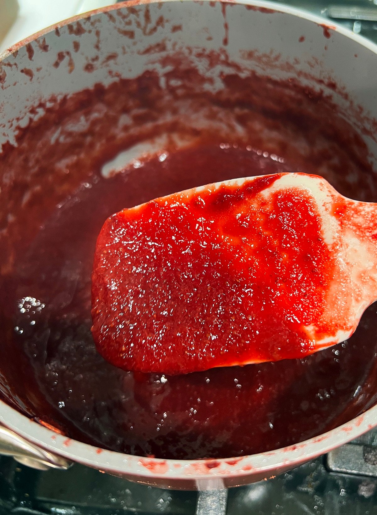 reduced strawberry in a saucepan