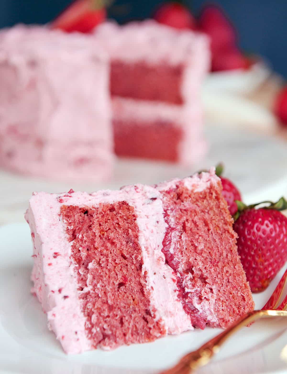 close up of a slice of strawberry cake