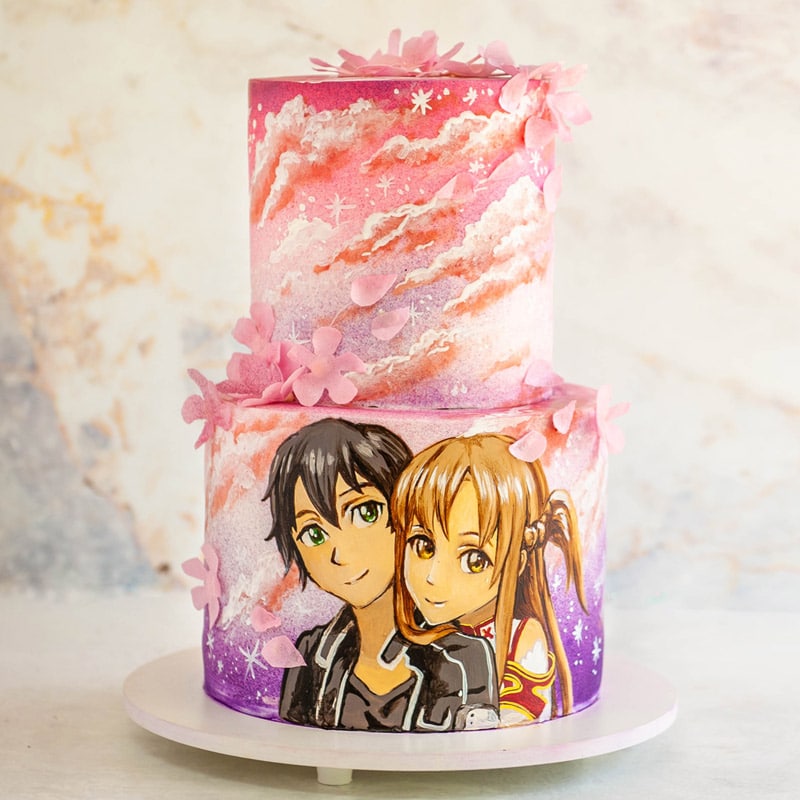 Stacked cake with airbrushed clouds and anime portrait painted with cocoa butter