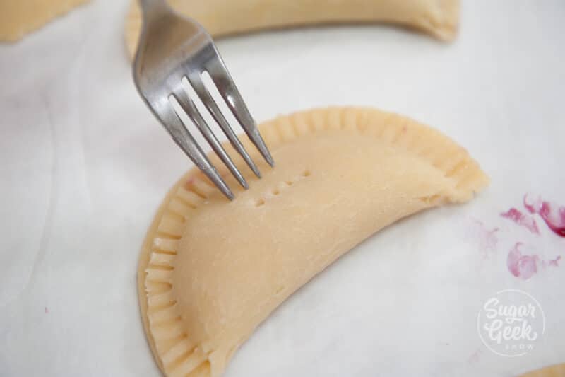 Venting the hand pie with a fork.
