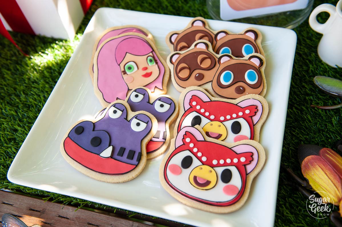 animal crossing sugar cookies on a white plate