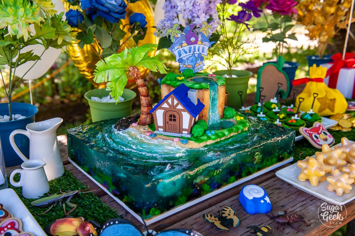 animal crossing cake surrounded by party decorations